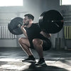 Barbell vs. Smith Machine Squats: Choosing the Perfect Squatting Companion